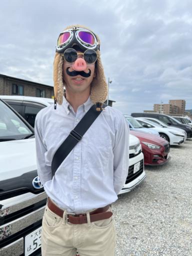 I am dressed as Porco Rosso. Fur cap, goggles, round sunglasses, a pig nose and a mustache